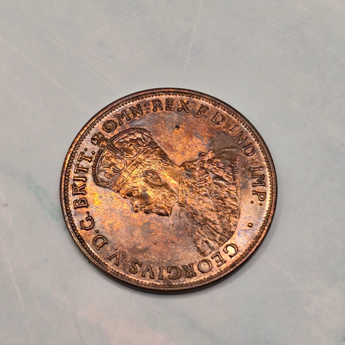1918I Penny struck at the Calcutta Mint. Uncirculated condition, PVC damage and toning. Obverse angled to show toning
