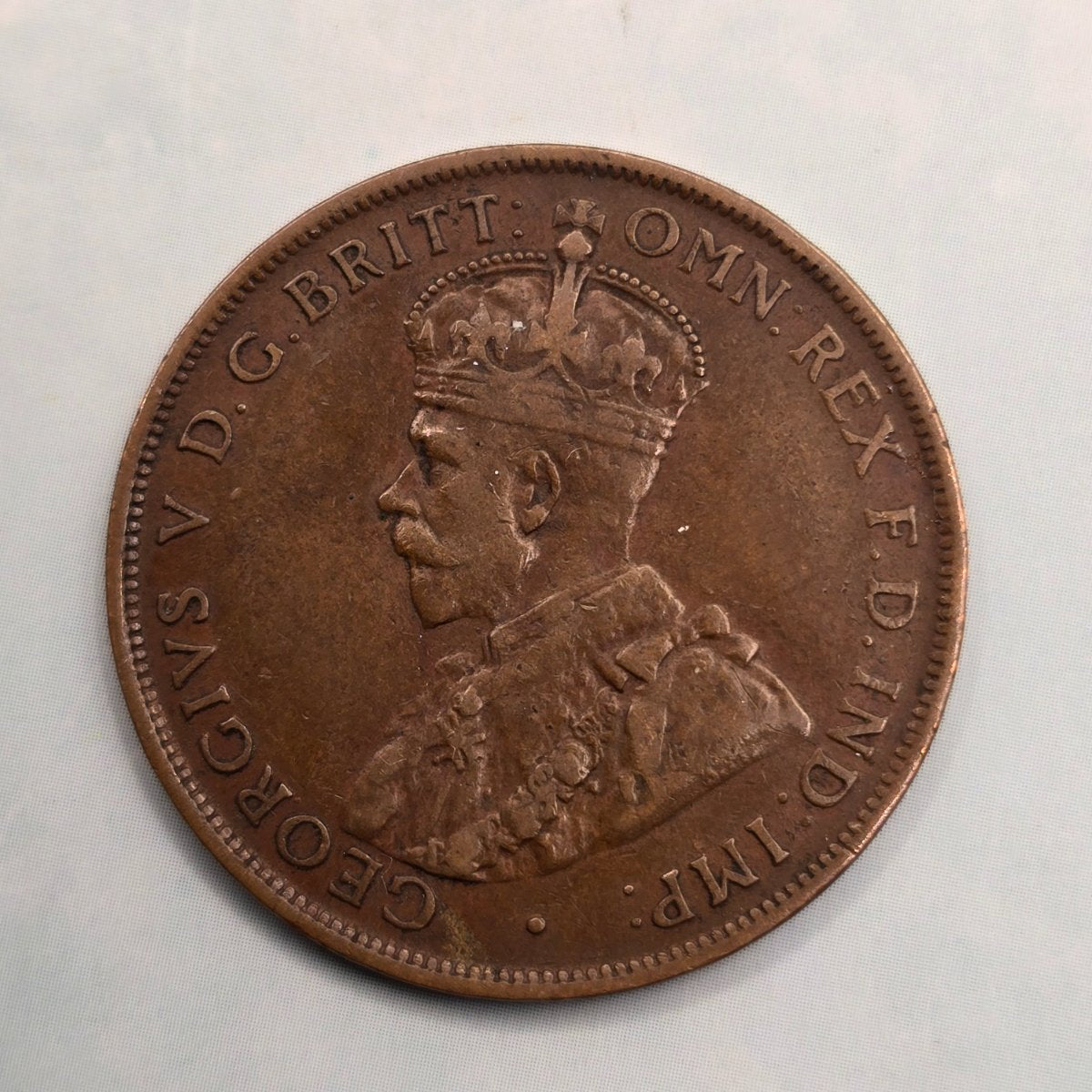 1925 Penny Key Date, second lowest mintage Australian Penny. Scarce Predecimal coin. Obverse with 6 visible pearls, wear and cleaned.