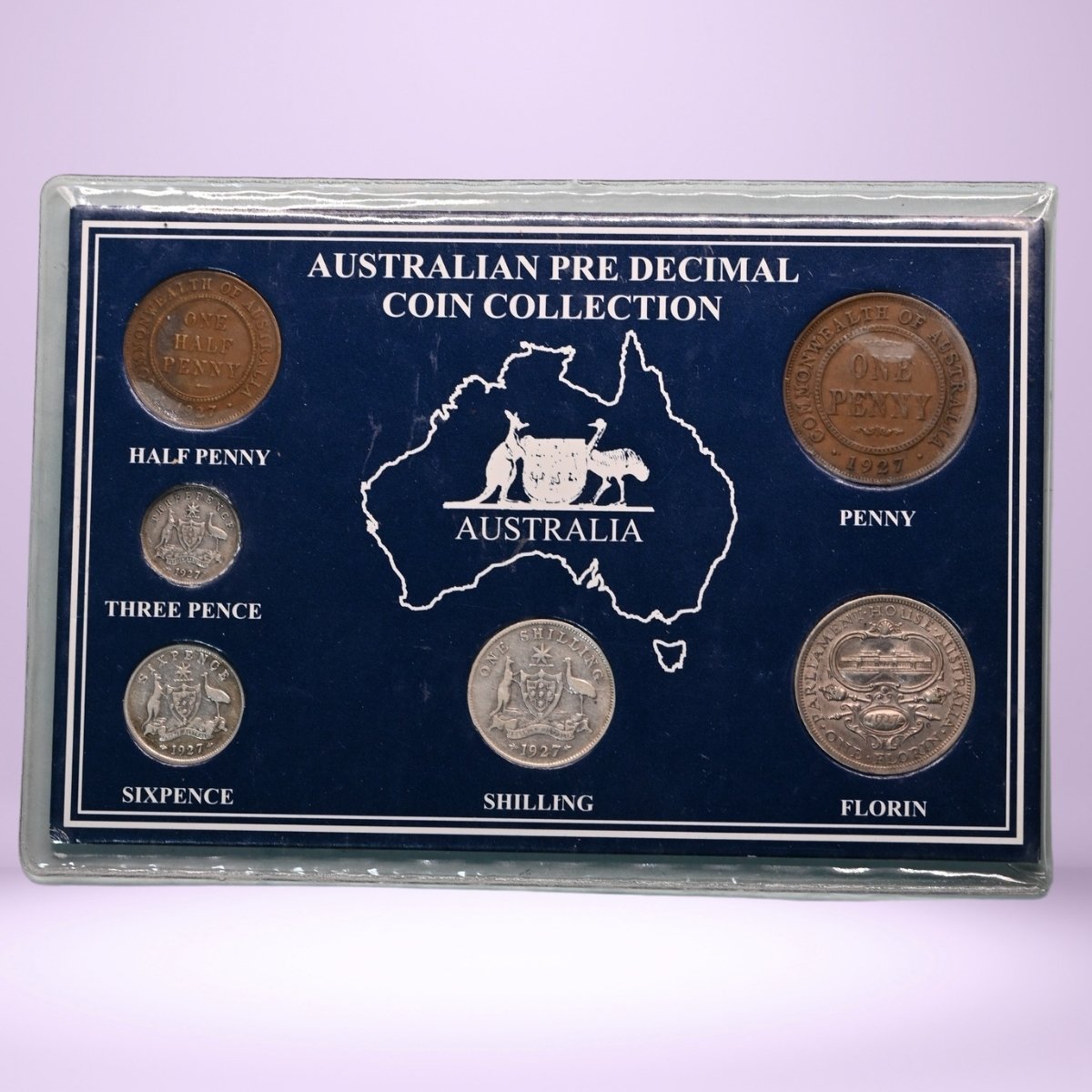 Australian 6 coin pre decimal coin collection in a display card with a map of Australia - reverse sides shown
