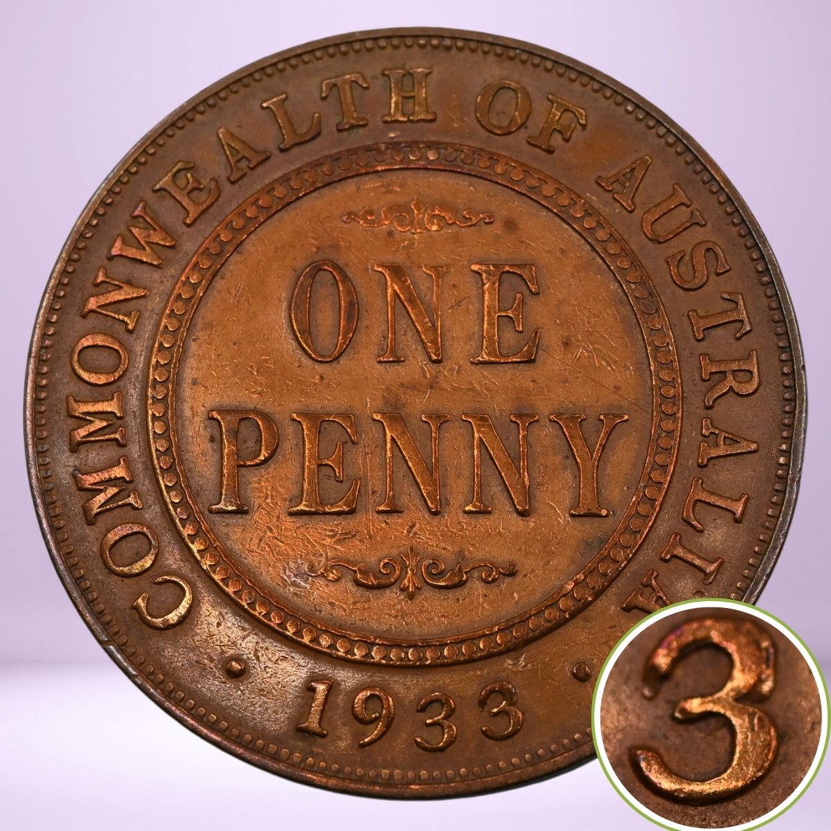 1933/2 overdate one penny coin from the Commonwealth of Australia with '1933' and magnified '3 struck over 2' detail. Reverse shown.