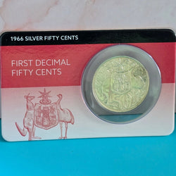 1966 silver fifty cents coin in Downies display card with text 'First Decimal Fifty Cents' - reverse side shown