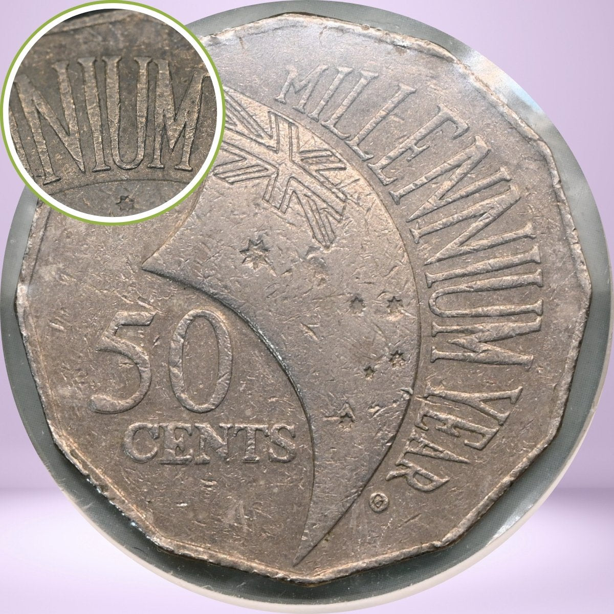 2000 50c Millennium Fat Letter reverse coin with close up 'NIUM' with middle thickening