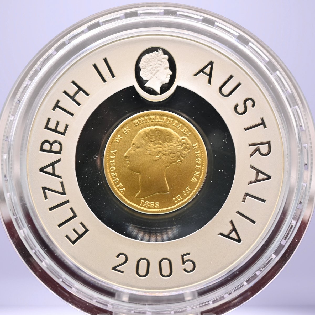 2005 $1 Silver Proof 60g Subscription coin with gold plated central Victoria effigy - text around legend 'Elizabeth II Australia 2005' and Elizabeth portrait above