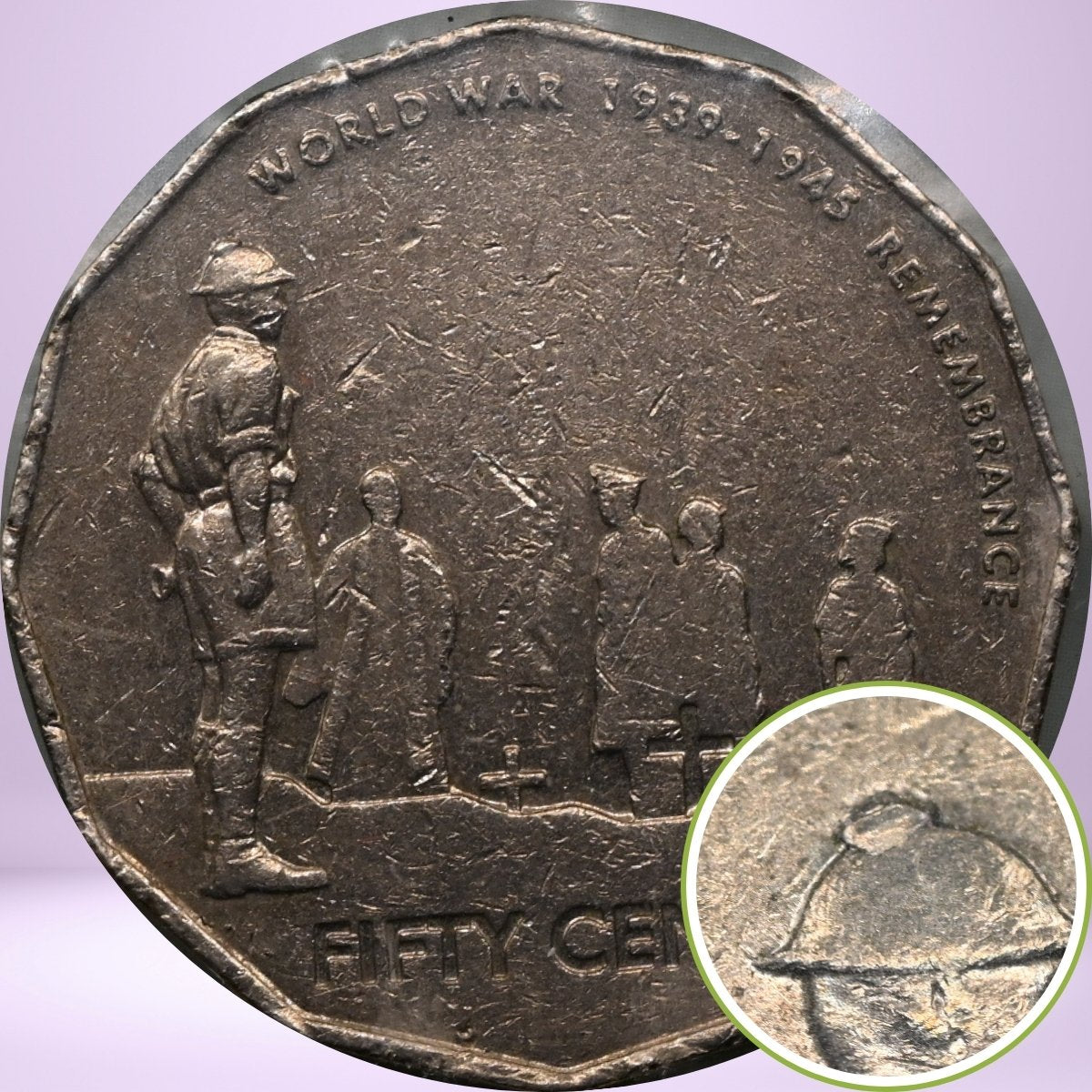 Reverse with close up of 2005 Australian 50 Cent Coming Home WWII Coin CUD error on soldier's helmet.
