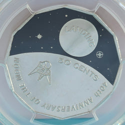 2009 50C Moon Landing coin reverse with text '50 Cents 40th Anniversary of the Moon Landing', in a PCGS holder.