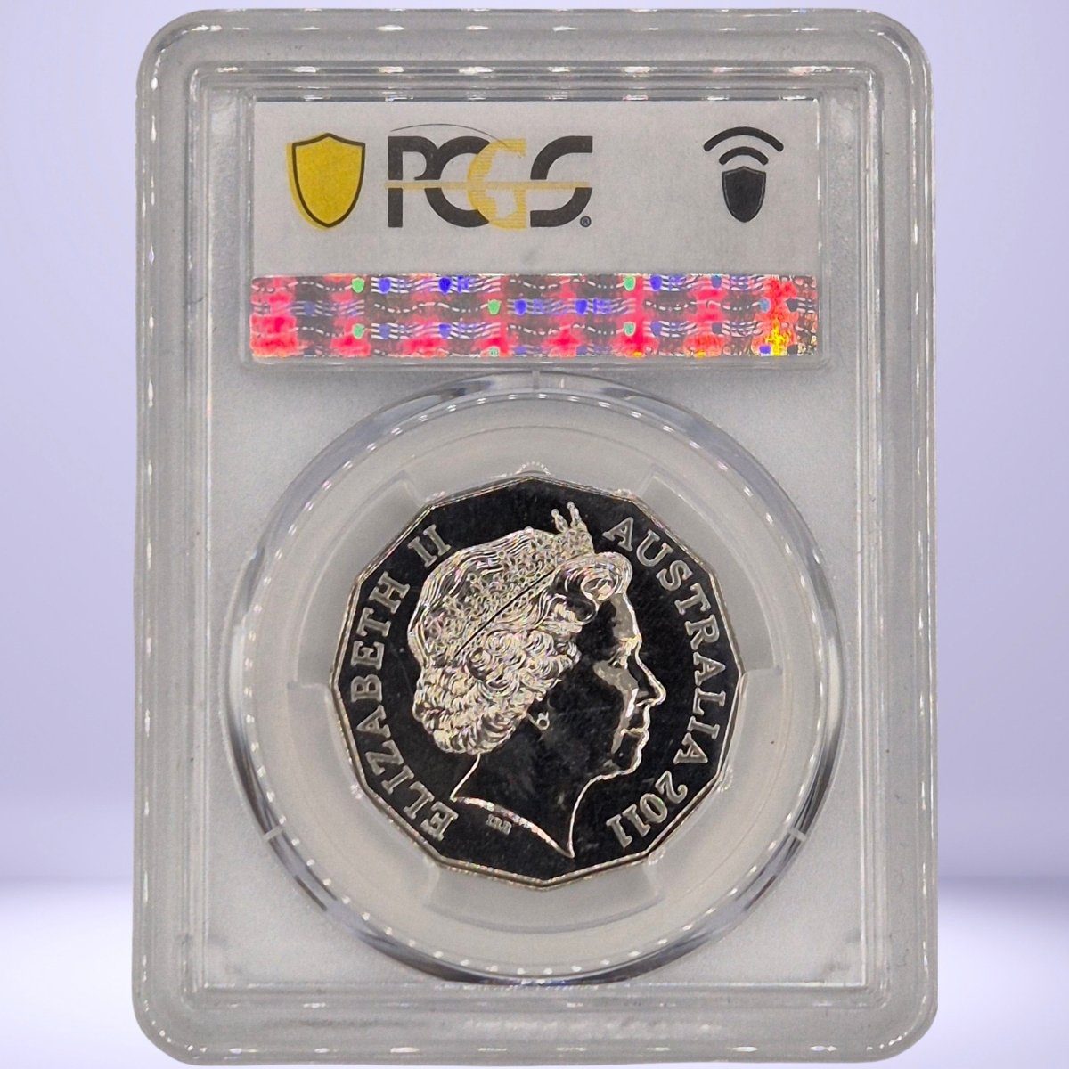 2011 50c Triple Zero coloured coin obverse - QEII profile - encapsulated in a protective holder with a PCGS label