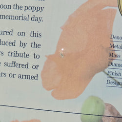 2012 $2 Remembrance Day Red Poppy on RSL Lest We Forget $10 Certificate of Donation close up pinhole damage to card