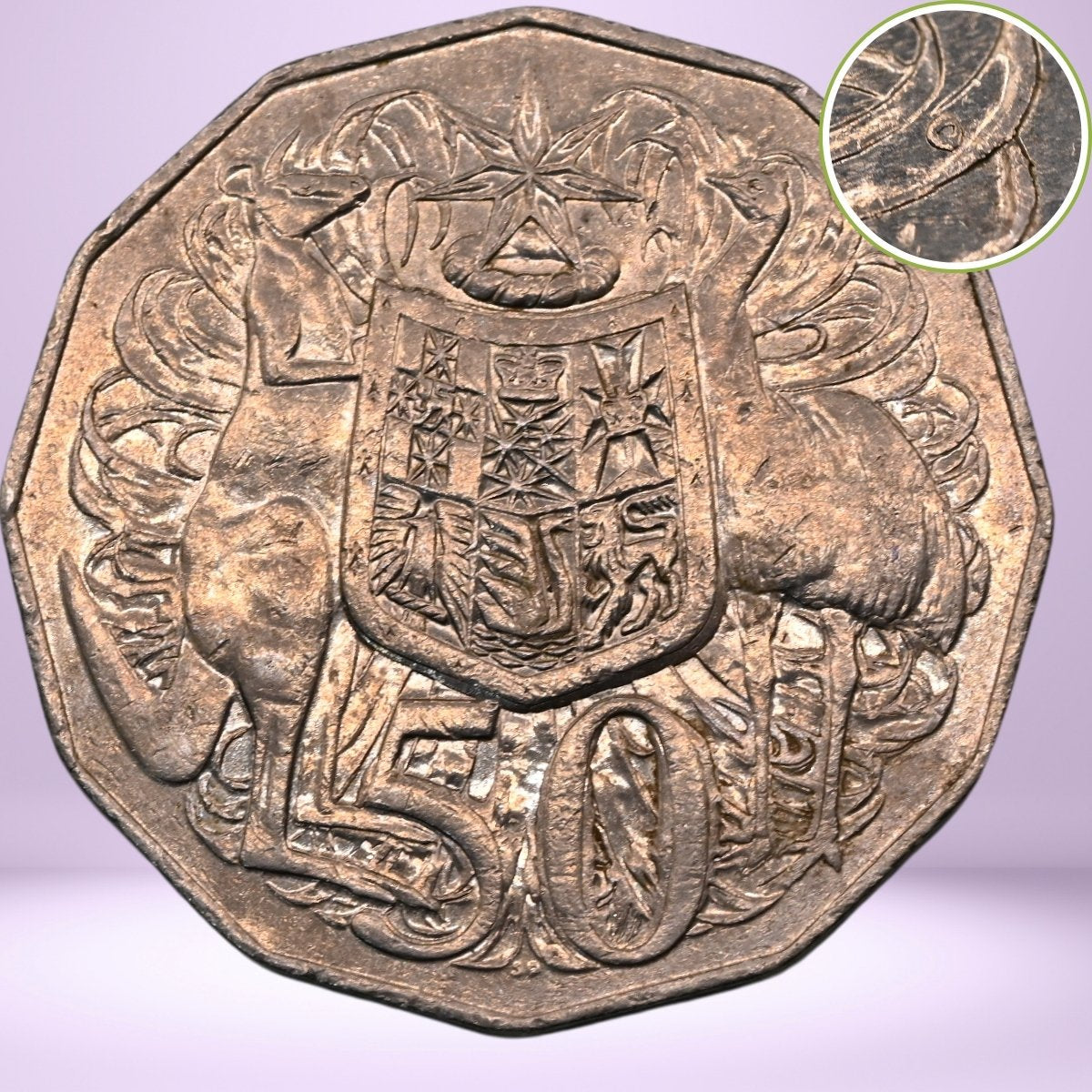 Close-up 2012 50c Australian coin with bubble above emus back - reverse side - magnified image of bubble