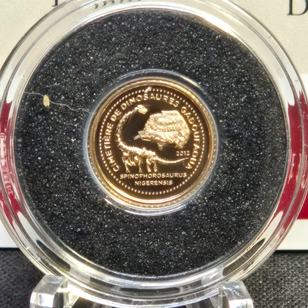 2012 Dinosaur Cemetery Gold Proof Coin – 1500 Francs, Macquarie Mint (0.5g .585)