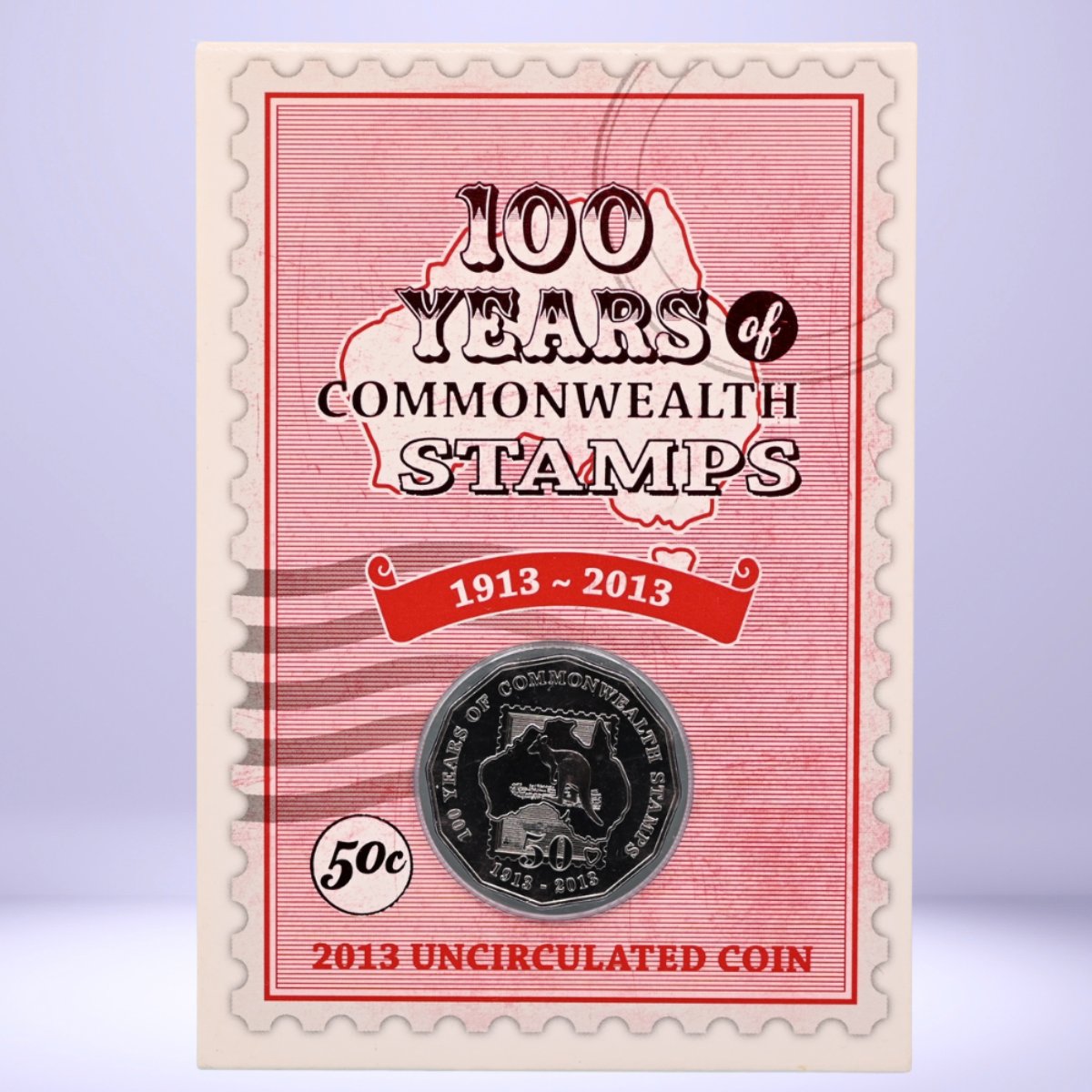 Packaging for a coin celebrating 100 years of Commonwealth stamps with a red and beige design. reverse 2013 50cc