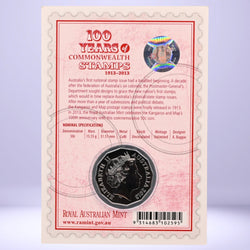 2013 50c Royal Australian Mint coin in a display card with text about 100 years of Commonwealth stamps - obverse