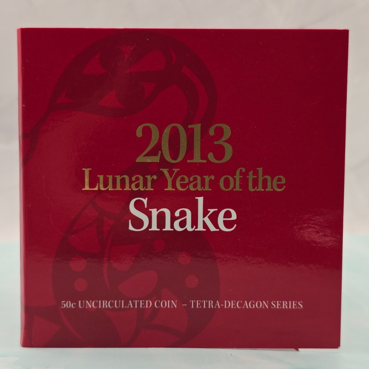 2013 50c Lunar Year of the Snake 50c Uncirculated Coin Tetra Decagon Series Front Cover