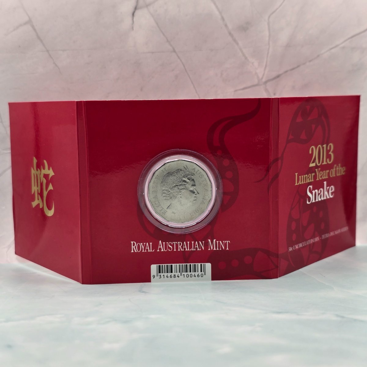 2013 50c Lunar Year of the Snake 50c Uncirculated Coin Tetra Decagon Series back of trifold