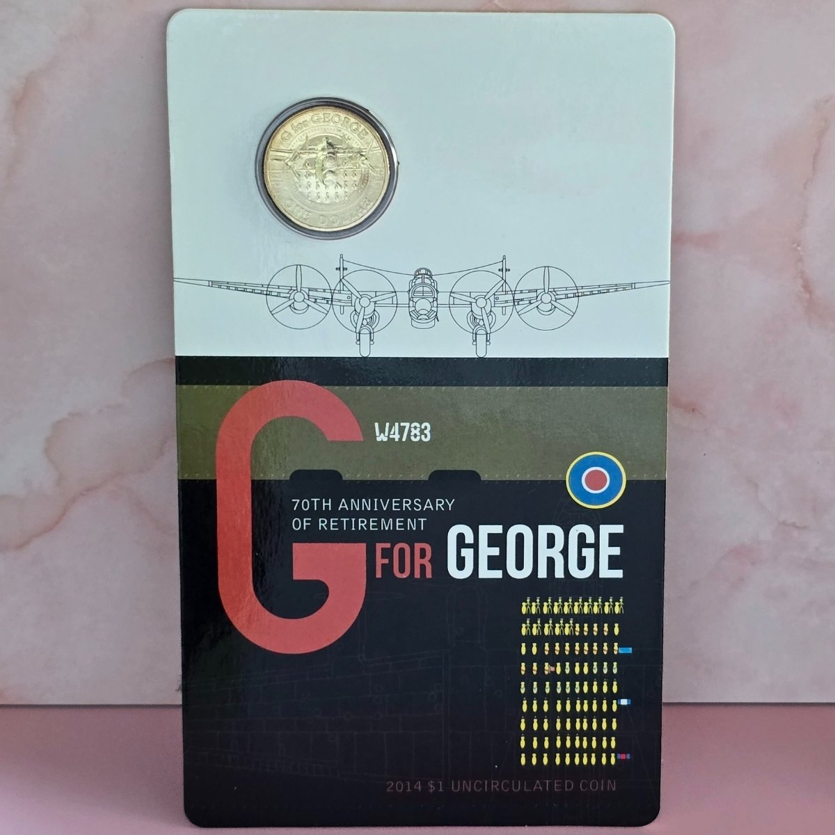 2014 $1 coin in large Royal Australian Mint card with 'G for George' design
