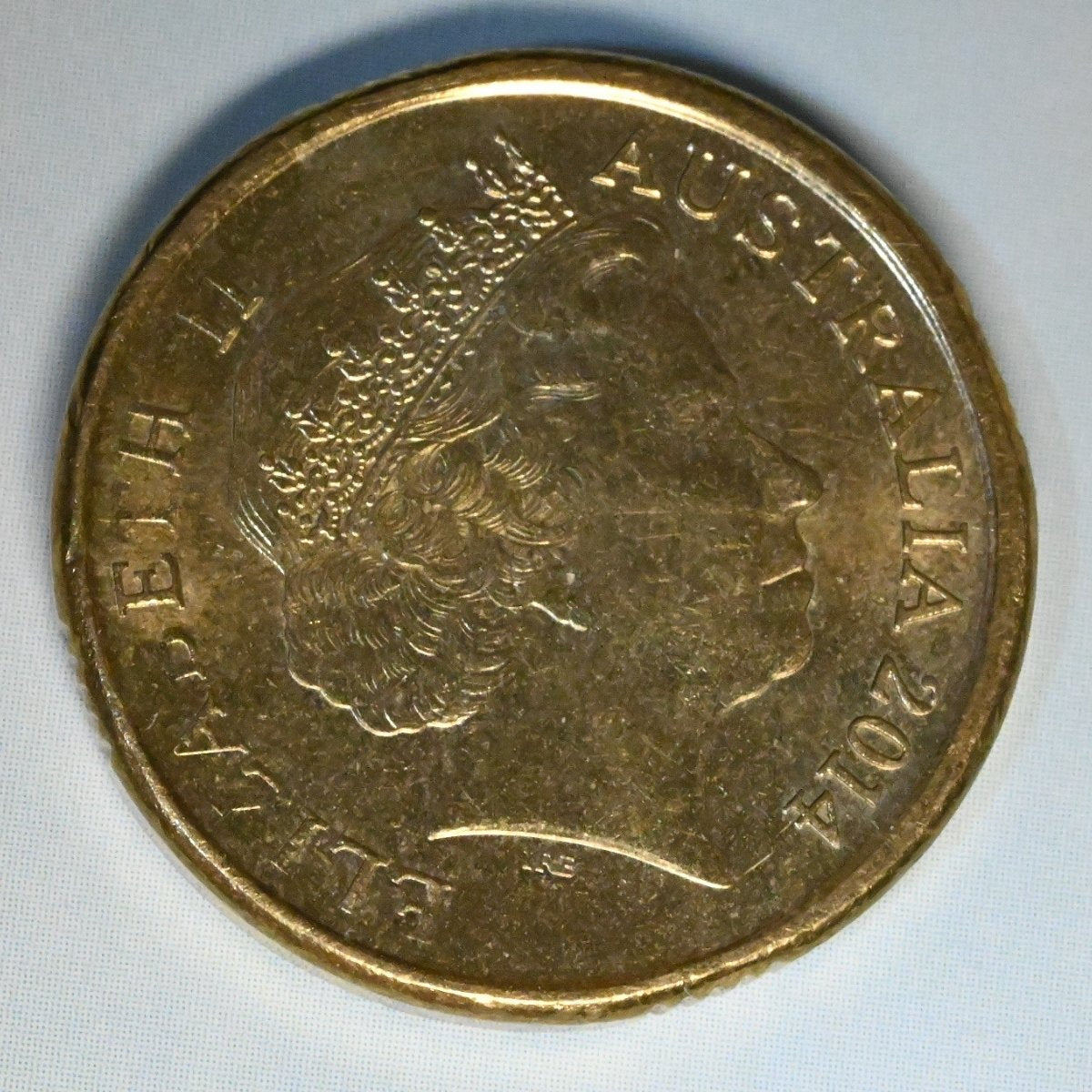 2014 $2 Remembrance Day Green Dove obverse - signs of wear