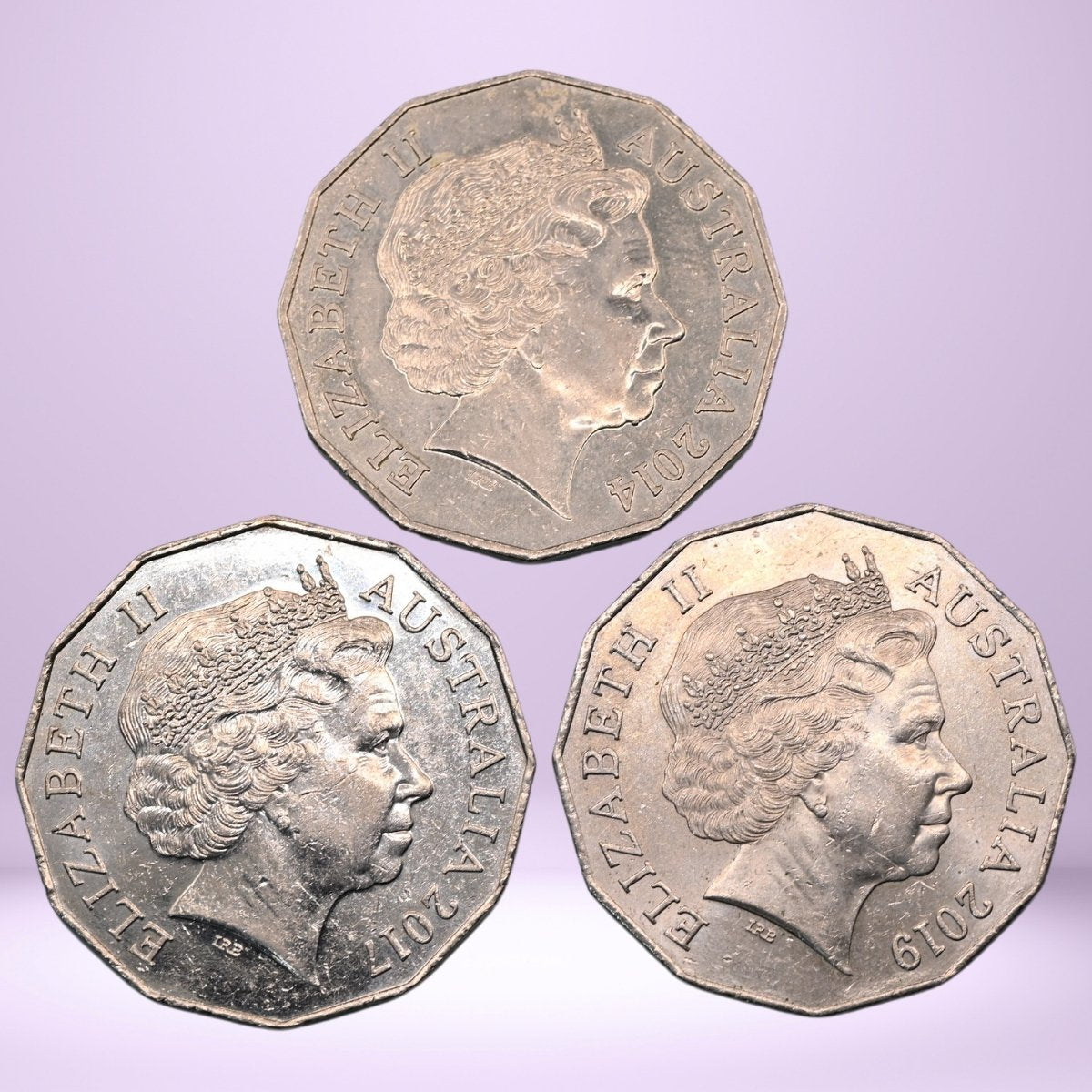 Three 50c obverse designs - Queen Elizabeth II Effigies - loose