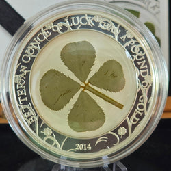 Silver 2014 $5 Republic of Palau Ounce of Luck coin with real four-leaf clover central inclusion - reverse side