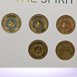 Five 2020 $2 Tokyo Olympics coins with cherry blossoms in blue, black, red, yellow and green - reverse of coins