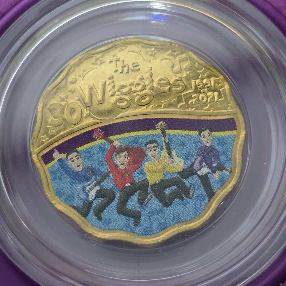 2021 30 years of the Wiggles Wiggly Coin Set Jukebox Tin with two scalloped 30c coins - reverse of one coin with 1991-2021 The Wiggles 30 above and pad printed Original Wiggles below