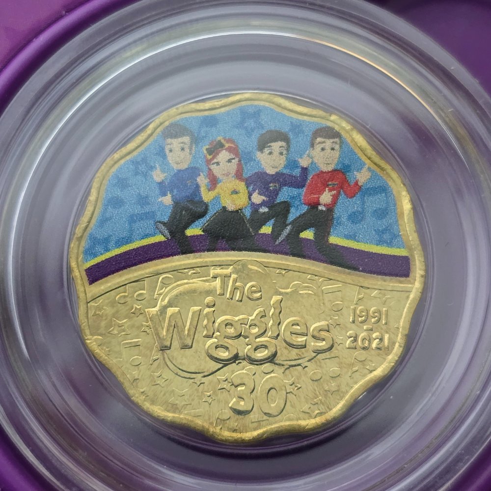 2021 30 years of the Wiggles Wiggly Coin Set Jukebox Tin with two scalloped 30c coins - reverse of one coin with 1991-2021 The Wiggles 30 below and pad printed New Wiggles above