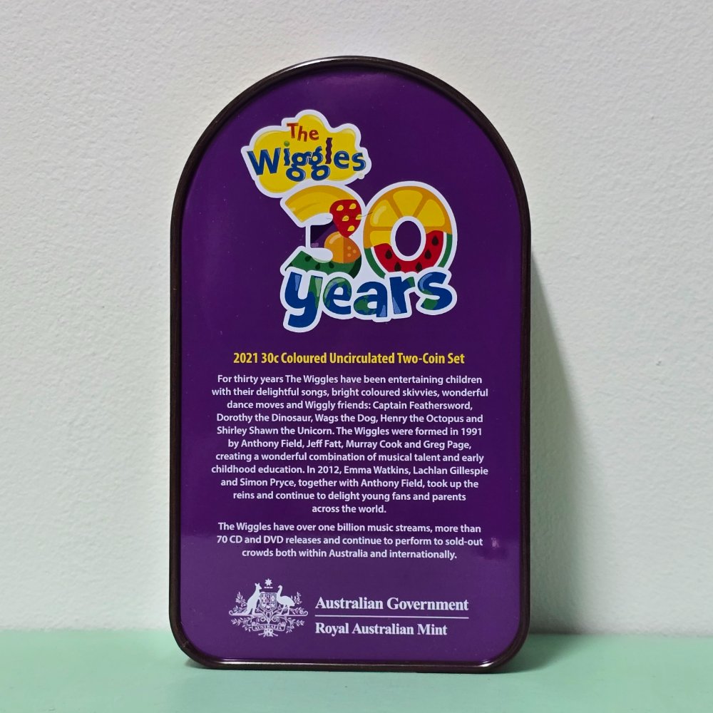 2021 30 years of the Wiggles Wiggly Coin Set Jukebox Tin with two scalloped 30c coins back of tin