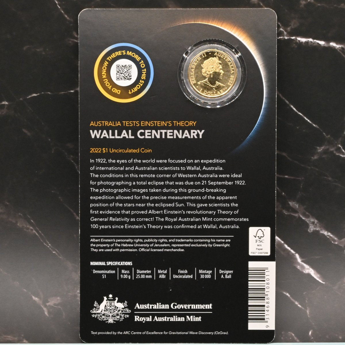 2022 $1 Wallal Centenary coin packaging with text, nominal specifications and a QR code
