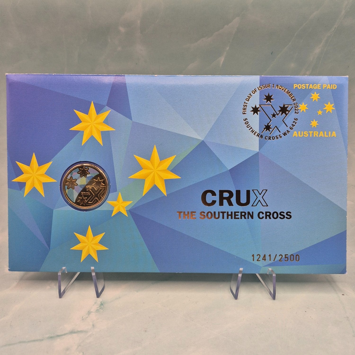 Front of 2022 $1 Impressions single coloured coin PNC Crux The Southern Cross