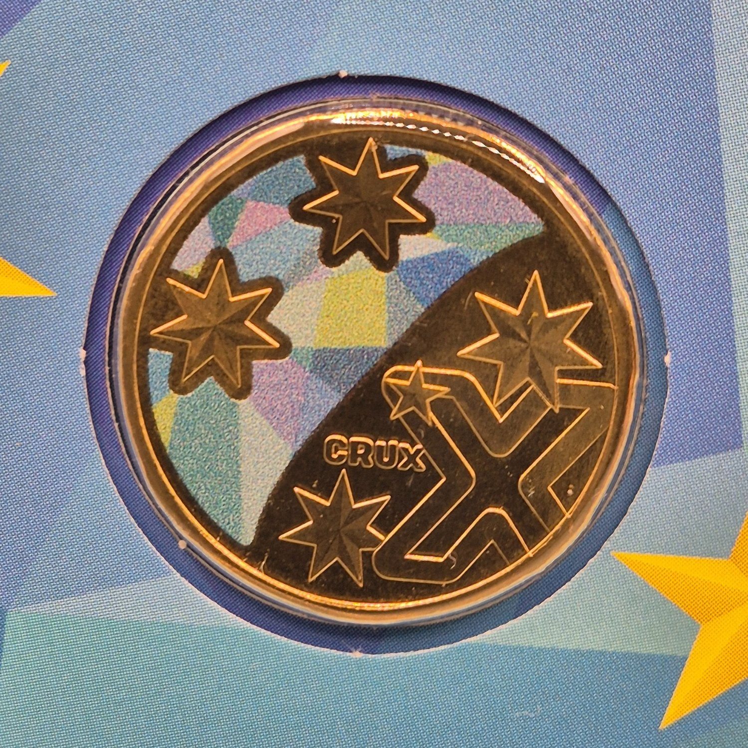 2022 $1 coloured coin - Crux The Southern Cross - close up reverse