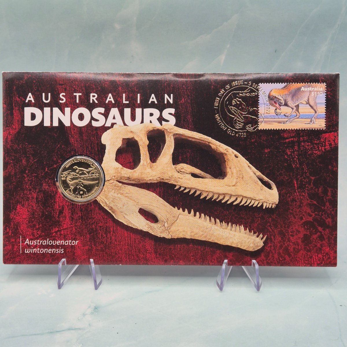 2022 $1 Australian Dinosaurs PNC with Fossil Head, gold foiling and envelope privy mark on coin, featuring Australovenator wintonensis