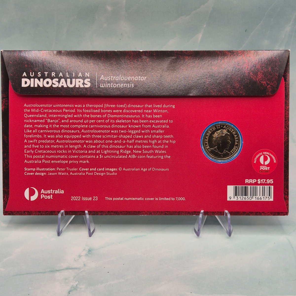 Back of 2022 $1 Australian Dinosaurs PNC featuring Fossil Skull Australovenator wintonenis gold foiling and envelope privy mark