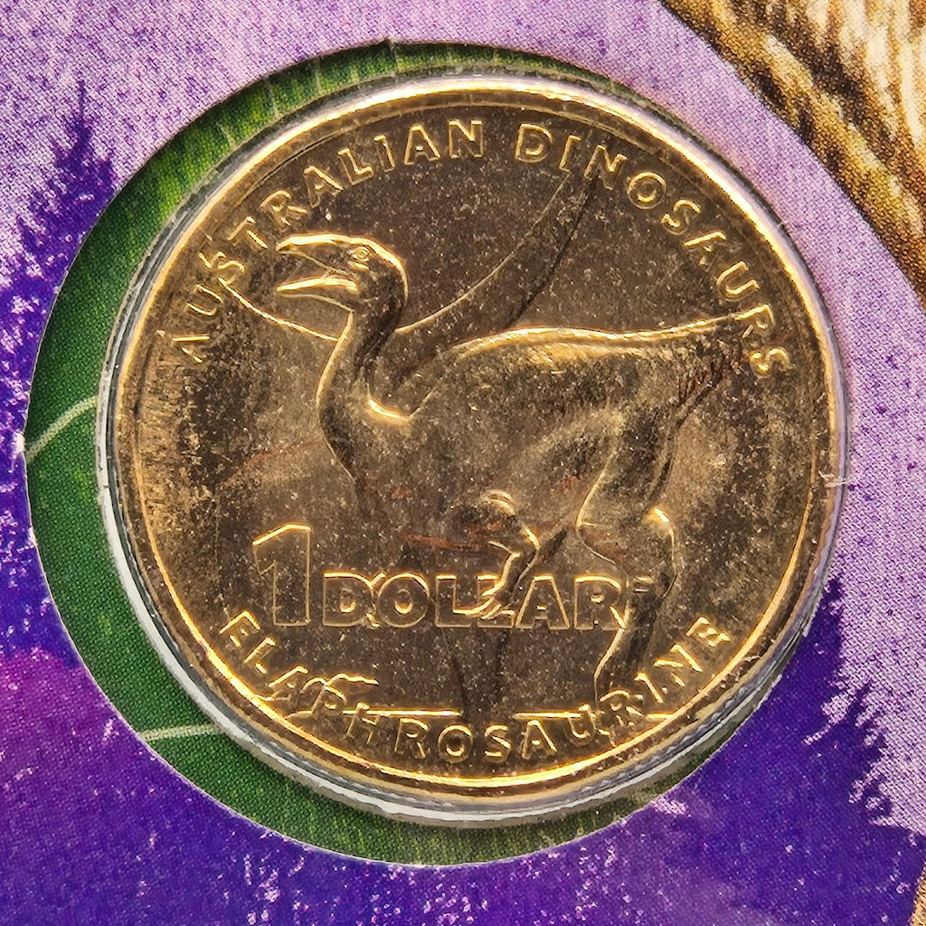 Close up reverse side of coin from 2022 $1 Australian Dinosaurs PNC featuring Elaphrosaurine theropod