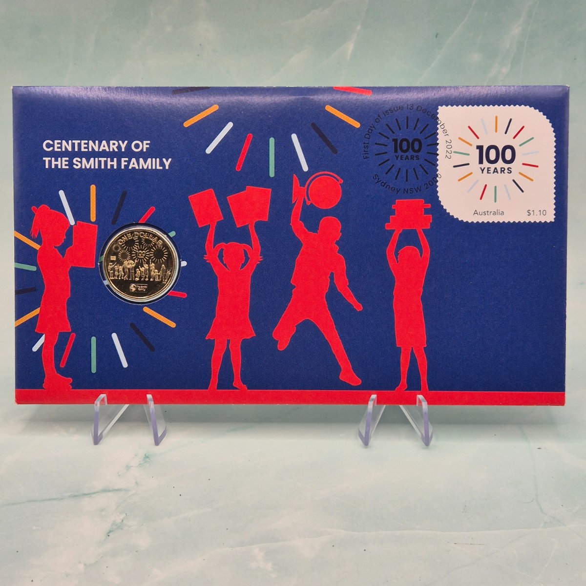 2022 $1 Centenary of the Smith Family PNC with Envelope Privy Mark on the reverse of the $1 coin