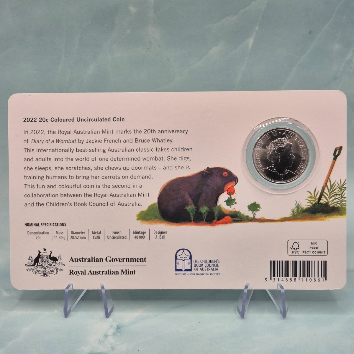 2022 20c coin obverse side in holder with a card featuring text and illustrations, including a wombat