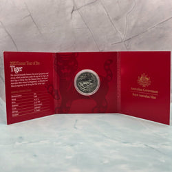 2022 50c Lunar Year of the Tiger 50c Uncirculated Coin Tetra Decagon Series inner of red trifold with gold foil accents