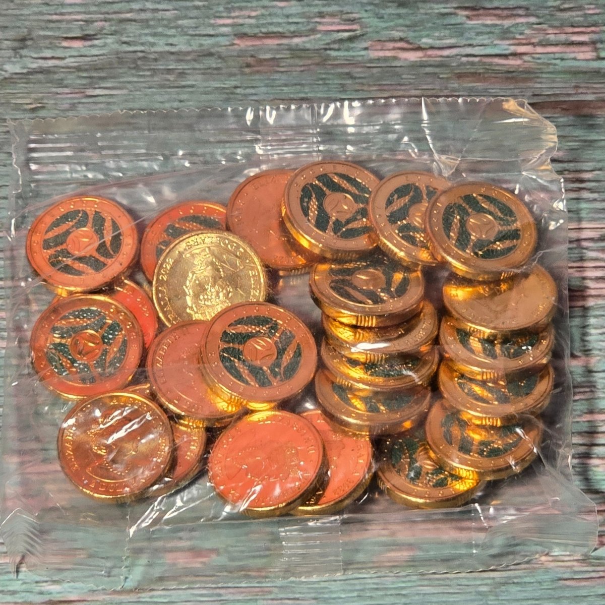 Twenty-Five [25] 2022 $2 coloured Socceroo coins in sealed security bag