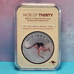 Silver coin in a protective case with 'MOB of Thirty - 2023 $1 'C' Mintmark Fine Silver - Frosted Uncirculated Coin' text - reverse side