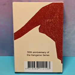 Coin outer packaging back of slip with red kangaroo hind legs and tail design - text about the 'Kangaroo Series' 30th anniversary