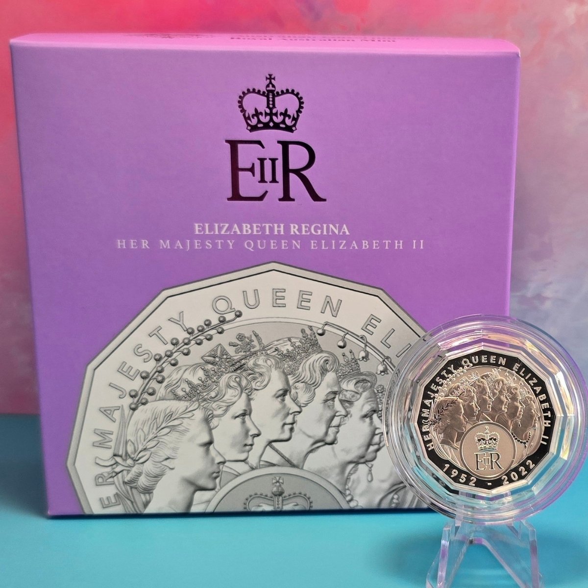 2023 50c silver proof coin with 'Her Majesty Queen Elizabeth II 1952-2022' design of all Australian effigies in front of a purple box with 'EIIR' branding - reverse side