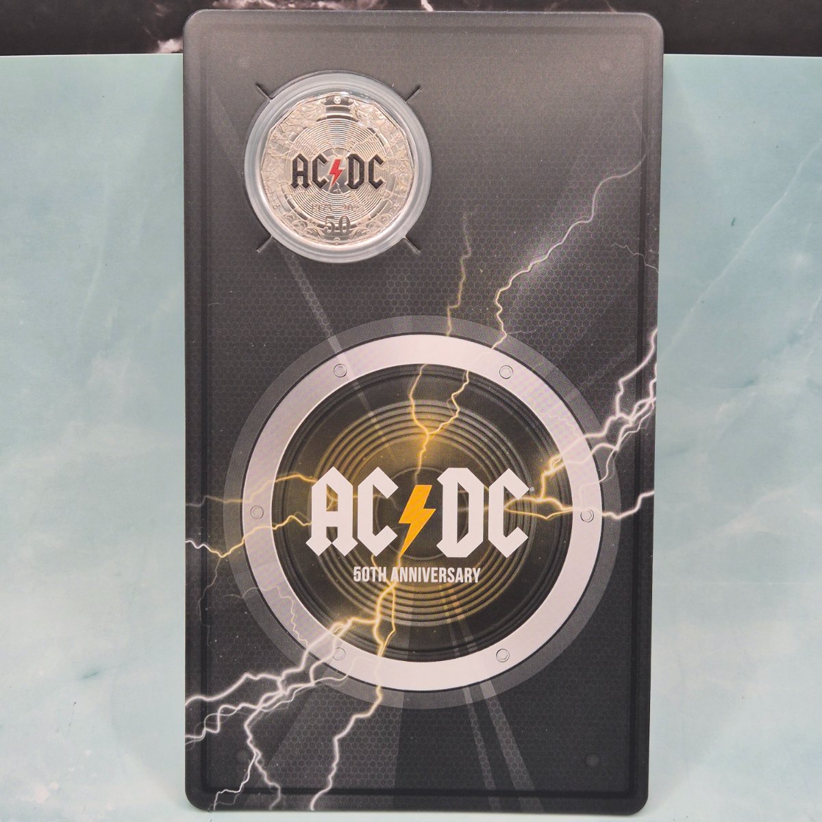 2023 50c AC/DC coloured coin with rock speaker inspired design in display card - reverse