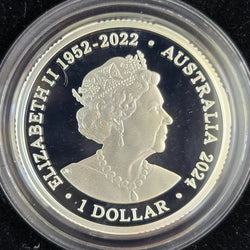 Silver $1 coin with Queen Elizabeth II 1952-2022 portrait and text 'Australia 2024' on a black background