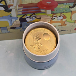 2024 $1 Bluey opened 10 Coin Tube and Folder struck by the Royal Australian Mint - Dollar Bucks - close up of opened tube with non-coloured Bluey top coin