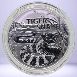 2024 $1 silver bullion coin with tiger snake design in capsule - reverse side