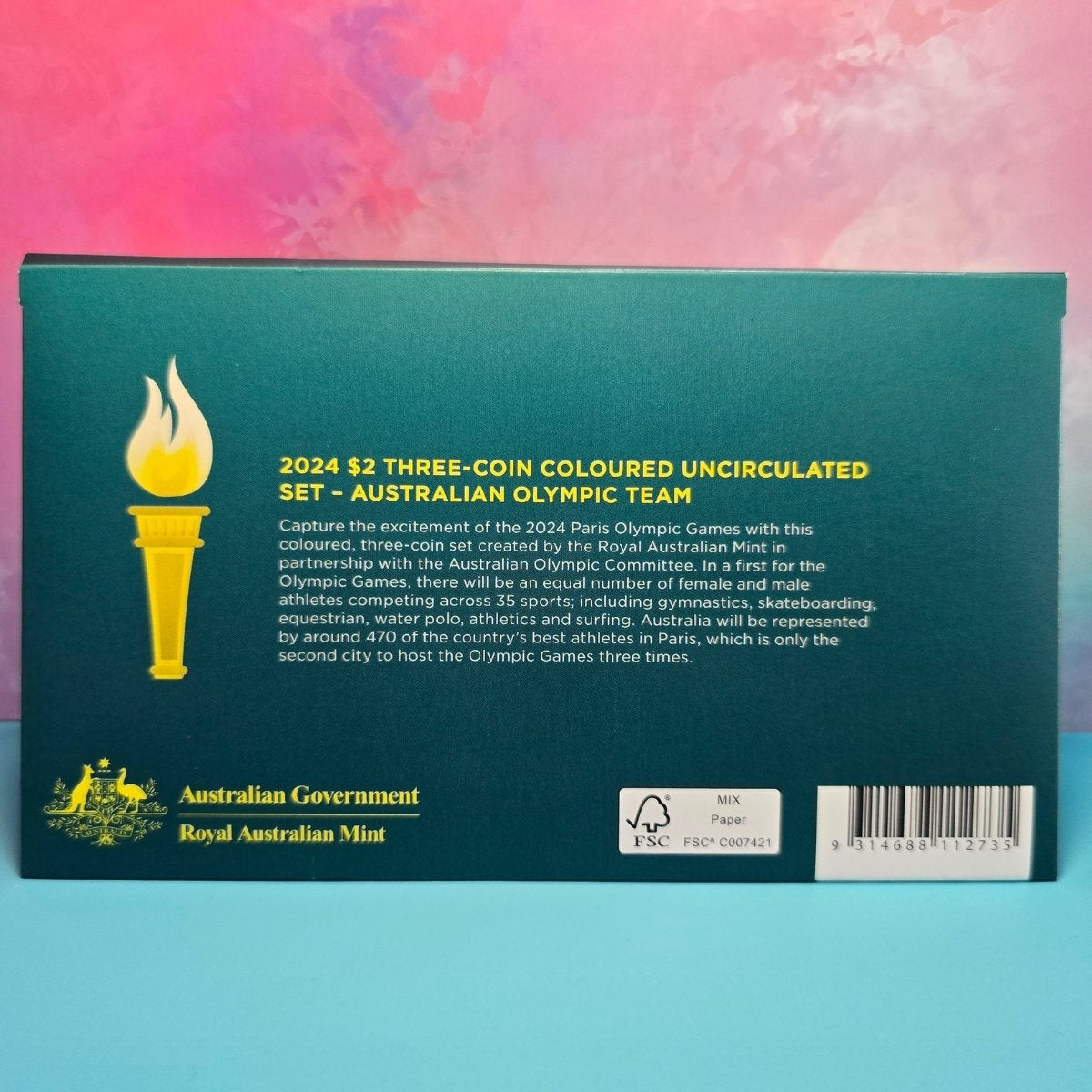 Back of packaging for a 2024 $2 three-coin coloured uncirculated set featuring the Australian Olympic Team on a colorful background.