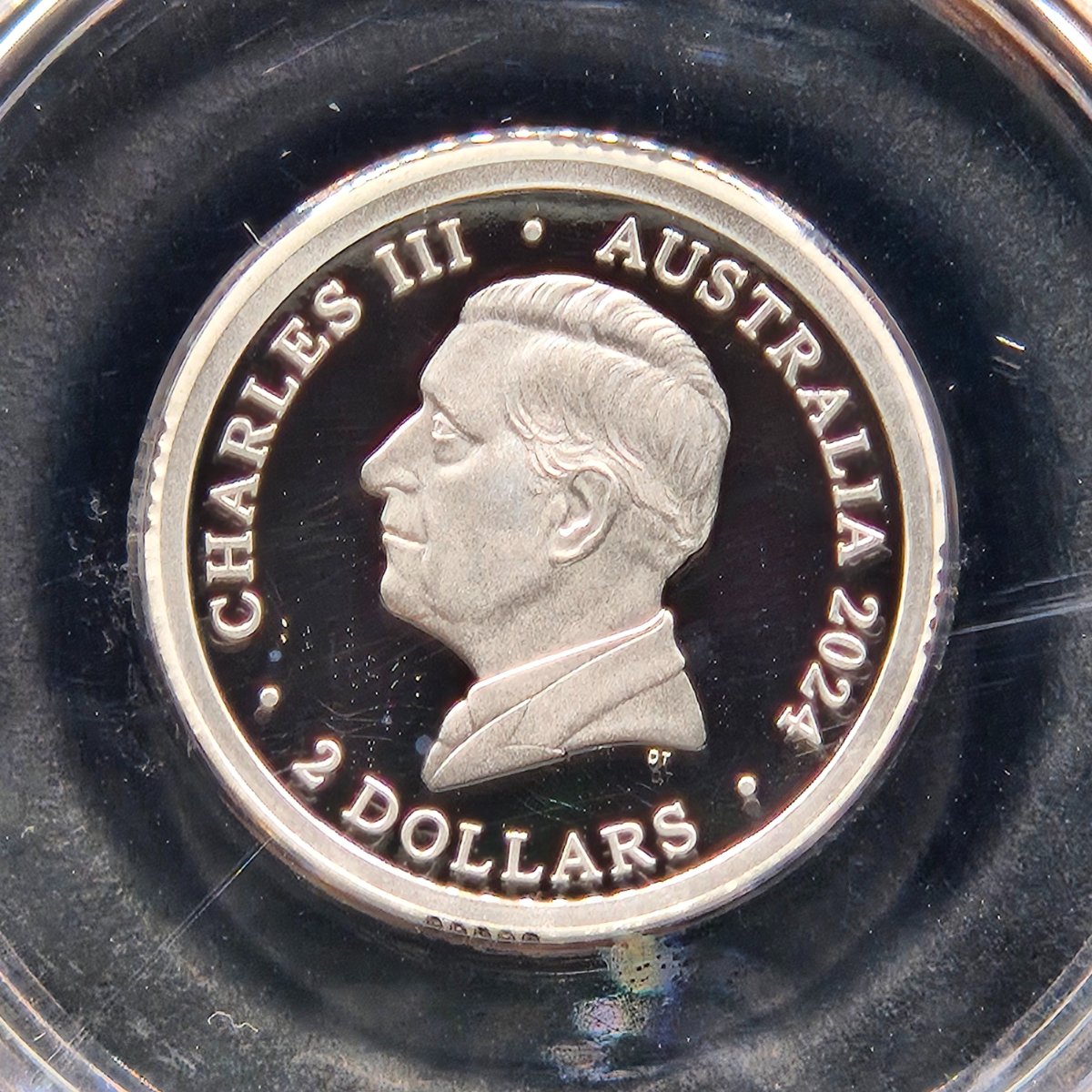 Obverse 2024 $2 Silver 'C' Mintmark War Animals Remembrance coin with portrait of King Charles III.