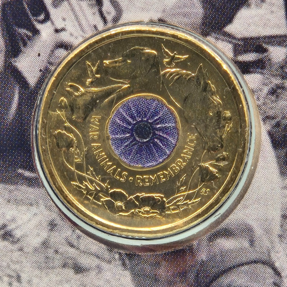 2024 $2 War Animals Remembrance PNC featuring two $1.20 Australian Postage stamps with Purple Poppies and a coloured uncirculated $2 Purple Poppy coin with Dove, Cat, Dog and Horse reverse of coin