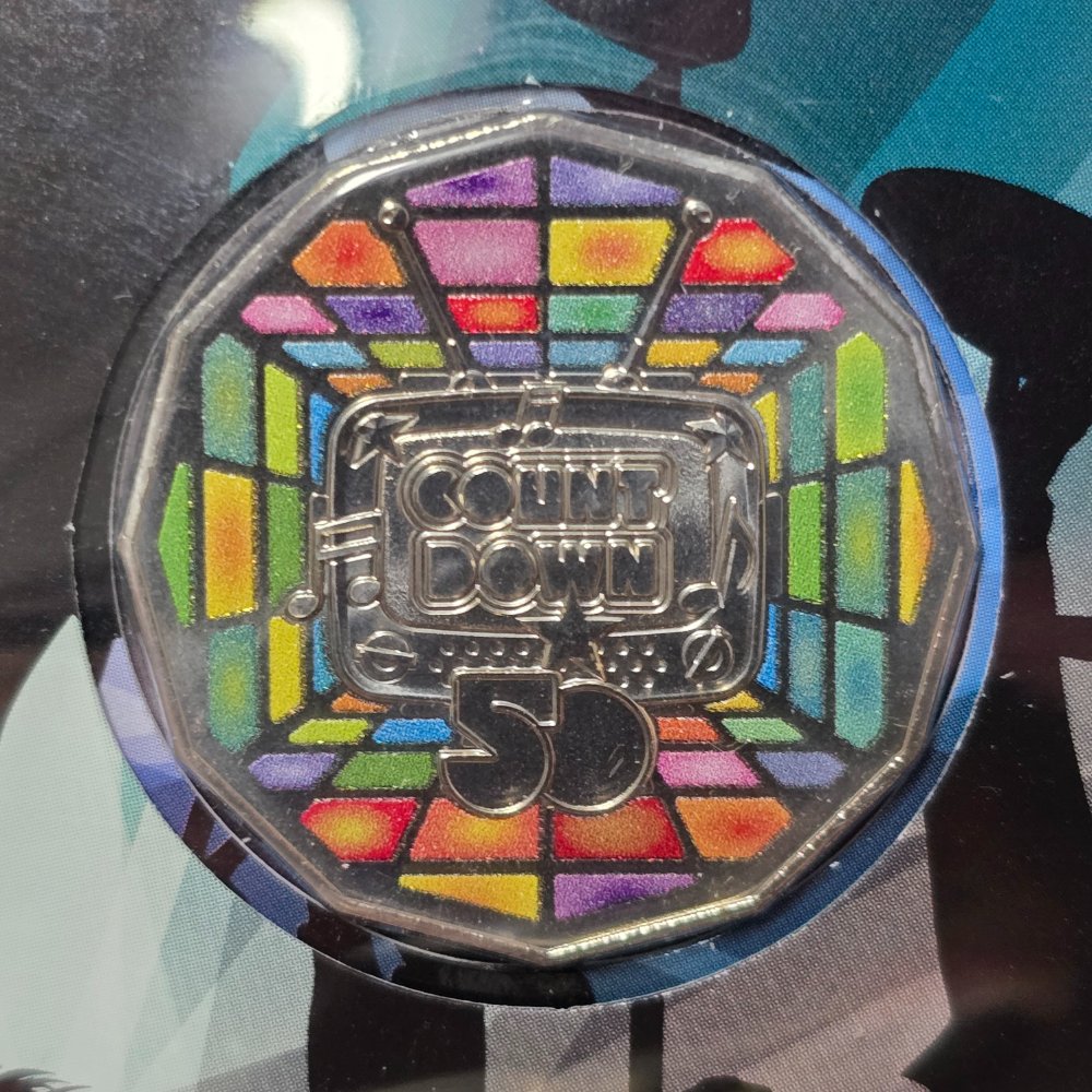 2024 50th Anniversary of Countdown PNC close up reverse side of coloured 50c coin