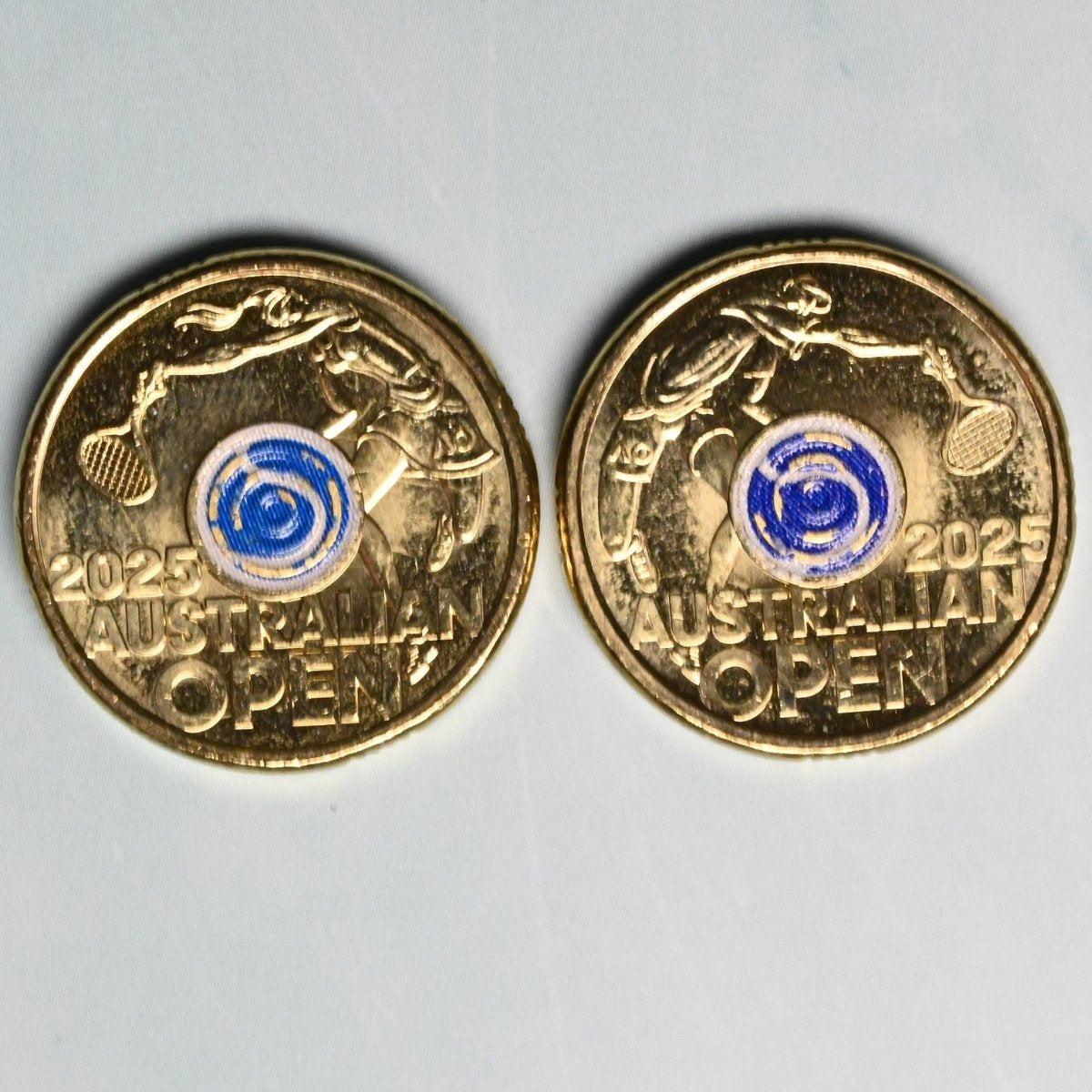 2025 $2 pair of Australian Open coins reverse shown, men's and women's designs, standard, paint chips