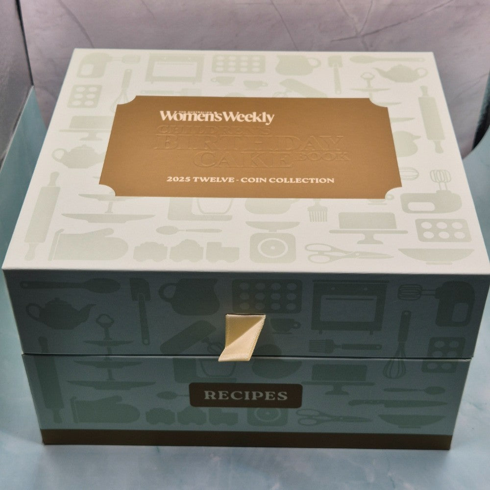 2025 Women's Weekly Birthday Cake 12 Coin Recipe Box with 11x $1 carded coins and 1x $2 carded coloured Hickory Dickory Watch coin