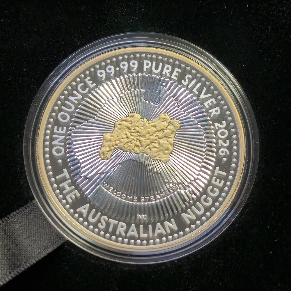 Reverse side of 1oz silver coin with gold nugget design